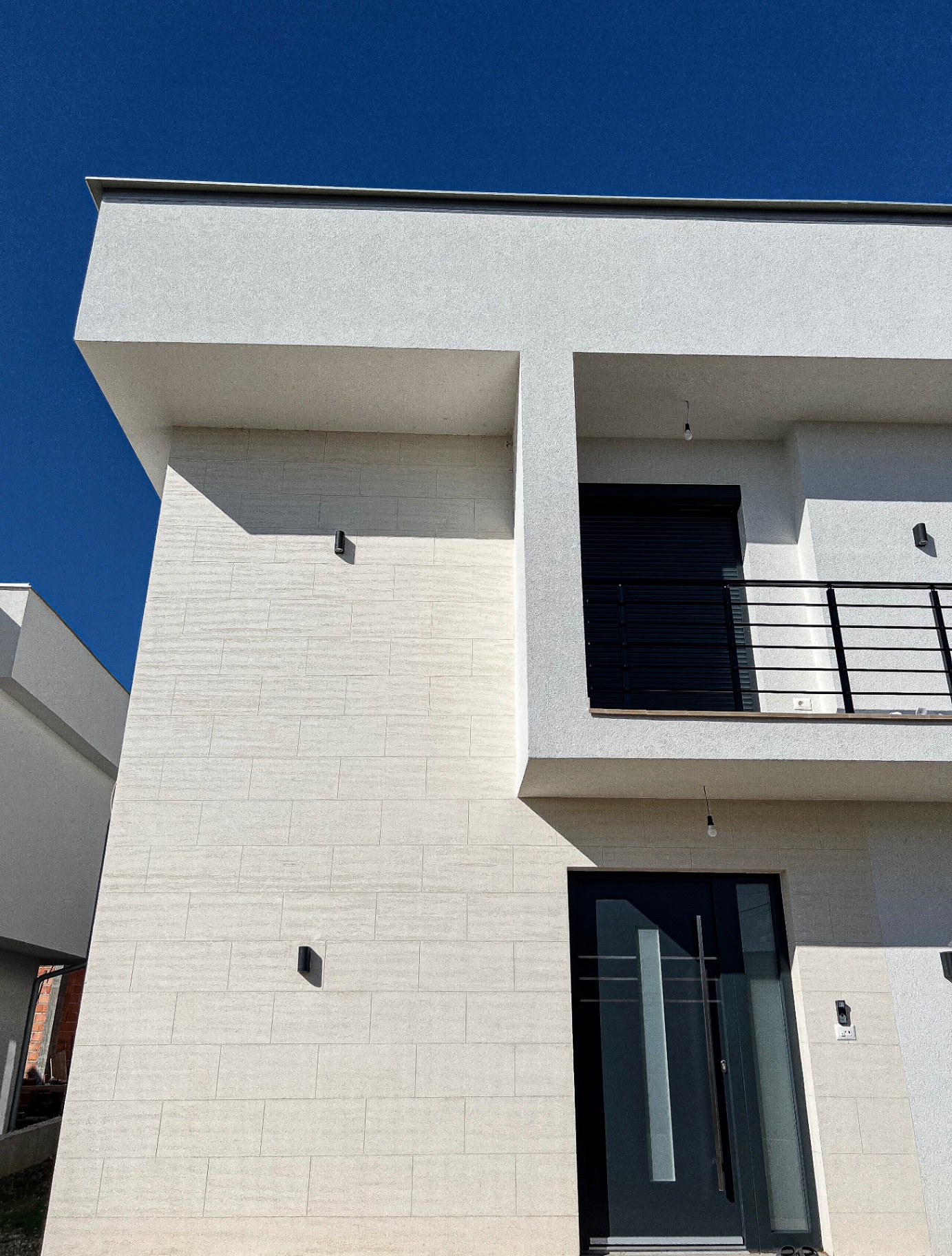 House Facade — Travertino